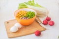 Spring salad in a bowl on the kitchen table Royalty Free Stock Photo