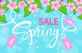 Spring sale background with with cherry blossoms flowers, fresh green leaves
