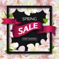 Spring sale background with ribbon and flowers. Season discount banner design with cherry blossoms and petals. Vector Royalty Free Stock Photo