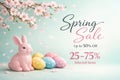 Spring sale banner with pink bunny, colorful easter eggs, and cherry blossoms Royalty Free Stock Photo