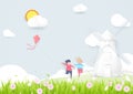 Spring season concept. Boy and girl playing kite with Windmills