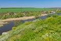 Landscape with rocky Sura riverside and summer cottages near Dnipro city, Ukraine