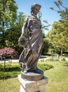 Spring season represented by statue. Garden of the crystal palace in Porto.