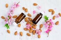 Spring Spa background with almond essential oil and flowers