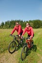 Spring - Sportive couple biking in nature