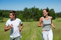 Spring - Sportive couple jogging outdoors