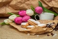 Spring still life with a cup, biscuits, coffee, sugar