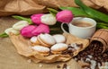 Spring still life with a cup, biscuits, coffee, sugar