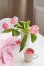spring still life with fresh pink tulips, home decor.