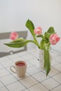 spring still life with fresh pink tulips, home decor.