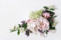 Spring, summer botanical floral composition, decorative corner. Pink peony flowers, sage, elderflower herbs and blooming