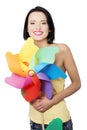 Spring/summer girl with color windmill toy Royalty Free Stock Photo