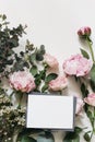 Spring, summer wedding still life scene Floral composition. Blank greeting card mockup. Pink roses, peonies flowers and Royalty Free Stock Photo