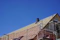 Construction site - A new house is being built. The tiles can be laid on the roof.