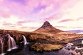 Spring sunrise over the famous Kirkjufellsfoss Waterfall with Kirkjufell mountain in the background in Iceland Royalty Free Stock Photo