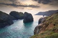 Spring sunset at high tide at Kynance Cove