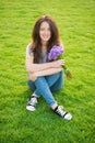 Spring surprise. Woman enjoy relax green grass background. Lady enjoy tender flowers bouquet. Femininity and tenderness Royalty Free Stock Photo