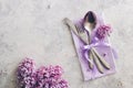 Spring table decoration with lilac flowers Royalty Free Stock Photo