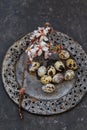 Spring table setting with blossoming almond branch and quail egg Royalty Free Stock Photo