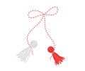 Spring talisman martisor. Traditional romanian amulet with red and white figurine tied thread.