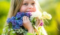 Spring teenager girl over nature green background. Outdoor portraits of beautiful smiling teenager girl. Teenager girl