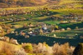 Spring time in beautiful agricultural landscape, green farm fields for animals and growing vegetables. Carpathian mountains, Royalty Free Stock Photo