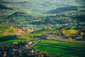 Spring time in beautiful agricultural landscape, green farm fields for animals and growing vegetables. Carpathian mountains, Royalty Free Stock Photo