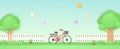 Spring Time, bicycle in the garden with colorful balloons flying above, plant pots and beautiful flowers on grass with fence