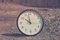 Spring Time Change. Summer back concept. Vintage alarm Clock outdoors Royalty Free Stock Photo