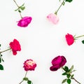 Spring time frame background. Floral composition of pastel pink roses flowers on white background. Flat lay, top view Royalty Free Stock Photo