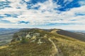 Spring time highland rocky mountain landscape scenic view windy plateau top wilderness environment cloudy blue sky background, Royalty Free Stock Photo