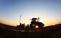 The tractor in farmland farming Royalty Free Stock Photo