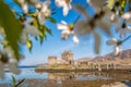 Spring trees against Eilean Donan Castle at Kyle of Lochalsh in the Western Highlands of Scotland