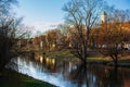 spring trees reflected in water, Danube river in Regensburg Royalty Free Stock Photo