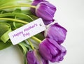 Spring tulips bouquet with Happy mother`s day card label , women`s or mother`s day holiday greeting with label card, beautiful Royalty Free Stock Photo