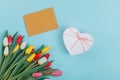 Spring tulips frame on background, top view. Royalty Free Stock Photo