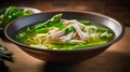 Spring vegetable broth filled with delicate asparagus and tender shredded chicken