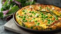 a spring vegetable frittata, filled with asparagus, peas, and feta cheese, served with a side salad