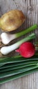 spring vegetables, fresh, potato,garlic,onion, and radish , Royalty Free Stock Photo