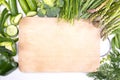 Spring veggies and wooden cutting board. Green seasonal vegetables, top view. Frame, banner with a copy space.