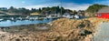 Spring view of norwegian marina with fishing boats laying in a Royalty Free Stock Photo