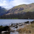 Spring view with snow over Ullswater near Aira Force waterfall towards Helvellyn, Lake District National Park Royalty Free Stock Photo