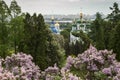 Spring view of Vydubychi Monastery and Dnipro river with lilac blossom in botanical garden in Kyiv Royalty Free Stock Photo