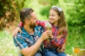 Spring village country. daughter and father love dandelion flower. little girl and happy man dad. earth day. ecology