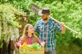 Spring village country. little girl and happy man dad. earth day. ecology. Gardening tools. family farm. summer farm Royalty Free Stock Photo