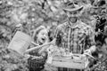 Spring village country. little girl and happy man dad. earth day. ecology. Watering can and shovel. family farm. father Royalty Free Stock Photo