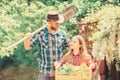 Spring village country. little girl and happy man dad. earth day. ecology. Gardening tools. family farm. summer farm Royalty Free Stock Photo