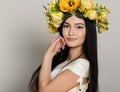 Spring Woman. Beauty Summer woman with colorful flowers wreath. Beautiful Lady with Blooming flowers on her head. Nature Royalty Free Stock Photo