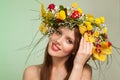 Spring Woman. Beauty Summer model girl with colorful flowers wreath. Flowers Hair Style. Royalty Free Stock Photo