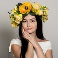 Spring Woman. Beauty Summer woman with colorful flowers wreath. Beautiful Lady with Blooming flowers on her head. Nature Royalty Free Stock Photo